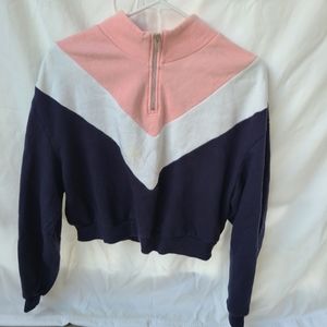 Divided pink white and black pullover size small